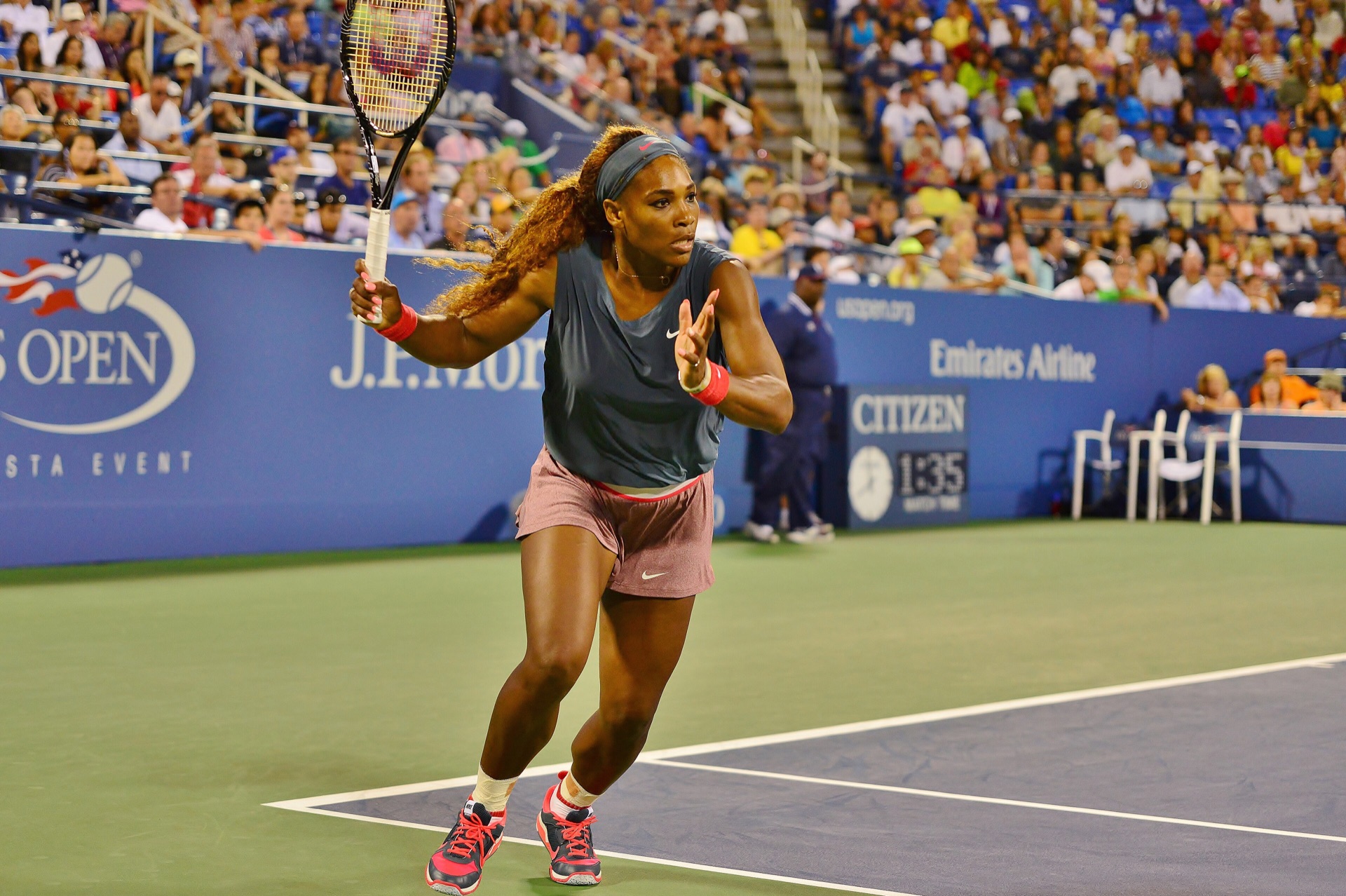 Serena Williams playing a forehand at the 2013 US Open.